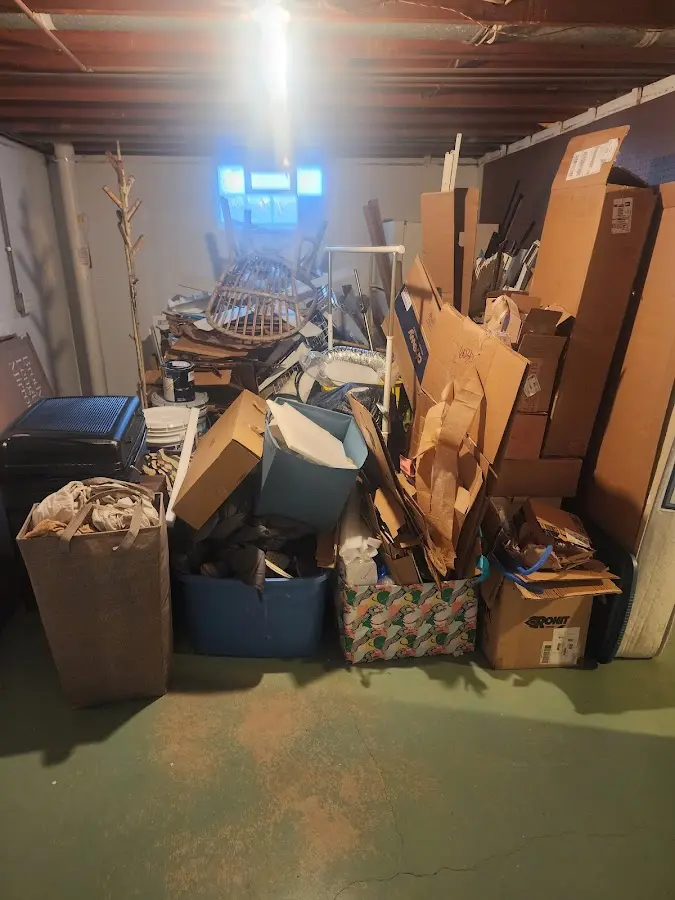 Roll-off dumpster container at job site for 4 Yard Dumpster Rental in St. Francis